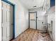 Laundry room includes connections for a washer and dryer and overhead storage at 2429 N Arsenal Ave, Indianapolis, IN 46218
