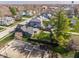 An aerial view of the house showcases a large backyard, patio, foundation, and shed at 310 W Staat St, Fortville, IN 46040