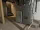 A utility area in the basement with a furnace and easy access to the stairs at 310 W Staat St, Fortville, IN 46040