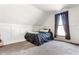 Bright bedroom with a large window and a comfortable bed, perfect for relaxing at 310 W Staat St, Fortville, IN 46040