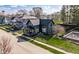 Beautiful two-story home with a covered front porch and mature trees in a quiet neighborhood at 310 W Staat St, Fortville, IN 46040