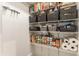 Well-organized pantry with wire shelving, baskets, and ample space for storage of food items at 310 W Staat St, Fortville, IN 46040
