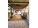 A look inside the spacious barn with horse stalls, dirt floor, and wood beams at 3395 State Road 44, Martinsville, IN 46151