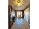 Hallway entrance with tile floors, grand father clock, and coat rack at 3395 State Road 44, Martinsville, IN 46151
