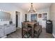 Comfortable dining area featuring a wooden table, seating, and modern decor at 3636 N Chester Ave, Indianapolis, IN 46218