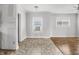 Empty dining room with tile floor, ready for personalization at 3704 Graceland Ave, Indianapolis, IN 46208
