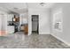 Bright kitchen and dining area, ready for updates at 3704 Graceland Ave, Indianapolis, IN 46208
