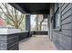 Covered porch with brick columns perfect for relaxing outdoors at 3704 Graceland Ave, Indianapolis, IN 46208