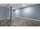 Spacious finished basement features durable flooring and recessed lighting at 3712 N Olney St, Indianapolis, IN 46218