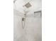 Bathroom shower with white marble tile and a built-in niche at 3712 N Olney St, Indianapolis, IN 46218