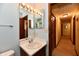 Compact bathroom with a vanity sink and a framed mirror at 381 Stoneybrook Grove Dr, Greenwood, IN 46142