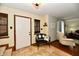 Cozy entryway featuring tile flooring, a decorative bench, and a glimpse into the living area at 381 Stoneybrook Grove Dr, Greenwood, IN 46142