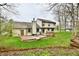 Back of home has spacious wooden deck great for entertaining and backyard enjoyment at 381 Stoneybrook Grove Dr, Greenwood, IN 46142