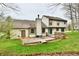 Two-story home featuring a spacious wooden deck perfect for outdoor entertaining at 381 Stoneybrook Grove Dr, Greenwood, IN 46142