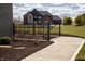View of a modern two-story home with a walkout basement and manicured lawn at 3899 Chapel Hill Ct, Bargersville, IN 46106