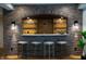 Finished basement bar featuring exposed brick, overhead lighting, and seating for four at 3899 Chapel Hill Ct, Bargersville, IN 46106