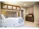 Basement bedroom with custom bunk beds, dresser, and neutral color scheme at 3899 Chapel Hill Ct, Bargersville, IN 46106
