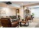 Finished basement featuring a comfortable seating area with a projector screen and a brick accent wall at 3899 Chapel Hill Ct, Bargersville, IN 46106