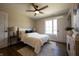 Bedroom featuring a bed with white linens, a ceiling fan, and a window for natural light at 3899 Chapel Hill Ct, Bargersville, IN 46106