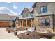Beautifully designed home with stone accents, a three-car garage, and a charming front porch at 3899 Chapel Hill Ct, Bargersville, IN 46106