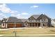 Beautiful two-story home showcasing a three-car garage and inviting front porch at 3899 Chapel Hill Ct, Bargersville, IN 46106