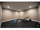 Spacious home gym with rubber floors, recessed lighting, and some workout equipment at 3899 Chapel Hill Ct, Bargersville, IN 46106