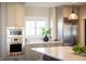 Modern kitchen featuring stainless steel appliances, stylish cabinets and plenty of counter space at 3899 Chapel Hill Ct, Bargersville, IN 46106
