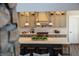 Modern kitchen with stainless steel appliances, quartz countertops, pendant lighting and a spacious island at 3899 Chapel Hill Ct, Bargersville, IN 46106