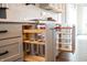 Well-organized kitchen boasts pull-out shelves and modern stainless-steel appliances at 3899 Chapel Hill Ct, Bargersville, IN 46106