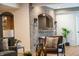 Basement living room featuring brick archway into wet bar and cozy seating area at 3899 Chapel Hill Ct, Bargersville, IN 46106