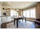 Bright home office featuring custom built-ins, a large desk, plenty of natural light, and hardwood floors at 3899 Chapel Hill Ct, Bargersville, IN 46106