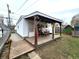 Back porch with outdoor seating area and view of the yard at 3949 Fletcher Ave, Indianapolis, IN 46203