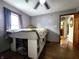 Cozy bedroom with hardwood floors, grey walls, and a creative built-in bed at 3949 Fletcher Ave, Indianapolis, IN 46203