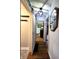 Hallway with a full view of the rooms, including a barn door entrance at 3949 Fletcher Ave, Indianapolis, IN 46203