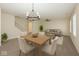 Bright living and dining area with contemporary decor, perfect for entertaining at 4363 Rhapsody Ln, Indianapolis, IN 46235