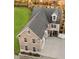 Aerial view of home showcasing its brick facade, landscaping, and driveway at 445 W 86Th St, Indianapolis, IN 46260