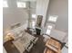 Bright, two-story living room with fireplace, tall windows, and an open floor plan at 445 W 86Th St, Indianapolis, IN 46260