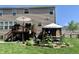 Expansive backyard with a patio, deck, and a gazebo perfect for outdoor living at 4846 Shakamak Ct, Indianapolis, IN 46239