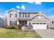 Lovely two-story home with vinyl siding, black shutters, attached two-car garage, and well-maintained lawn at 4846 Shakamak Ct, Indianapolis, IN 46239