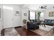 Open living room with hardwood floors, modern decor, and a bright, welcoming atmosphere at 4846 Shakamak Ct, Indianapolis, IN 46239