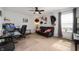 Bright living room featuring comfortable seating, modern decor, and a ceiling fan at 4846 Shakamak Ct, Indianapolis, IN 46239