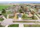 Wide aerial view of a charming neighborhood with lush greenery and mature trees surrounding the homes at 4921 Cottonwood N Ct, Columbus, IN 47203