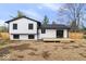 Two-story home with modern exterior, newly built deck, and spacious backyard at 4921 Cottonwood N Ct, Columbus, IN 47203