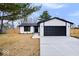 Charming single-Gathering home featuring attached garage, and well-manicured lawn at 4921 Cottonwood N Ct, Columbus, IN 47203