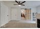 Bright bedroom features carpet, a closet, a ceiling fan, and complements the area's comfort and convenience at 501 W Pearl St, Trafalgar, IN 46181