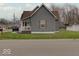 Beautiful home with a well-maintained lawn and inviting curb appeal in a quiet neighborhood at 501 W Pearl St, Trafalgar, IN 46181