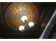 Ornate decorative ceiling with a vintage-style chandelier at 5347 N College Ave # Apt 109, Indianapolis, IN 46220