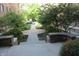 Inviting courtyard view, showcasing the beautifully landscaped walkway at 5347 N College Ave # Apt 109, Indianapolis, IN 46220