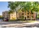 Charming brick apartment building featuring mature trees and manicured landscaping at 5347 N College Ave # Apt 109, Indianapolis, IN 46220