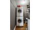 Laundry area featuring a stacked washer and dryer at 5347 N College Ave # Apt 109, Indianapolis, IN 46220